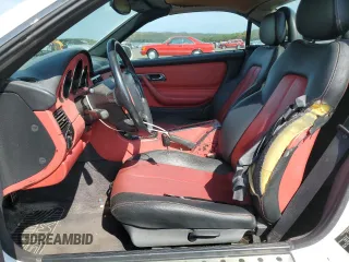 1999 Mercedes-Benz SLK-Class with VIN WDBKK47F9XF130501, listed as a Copart auction lot 71770824 with 124,669 mi miles and Clean Title. Bid and sale history available at carsss.com. Image 7.