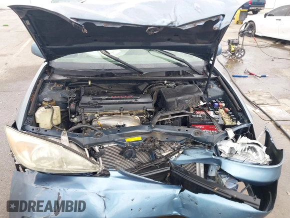 2002 Toyota Camry LE z VIN 4T1BE32KX2U617732, wystawiony jako IAAI lot #42208913 z przebiegiem Nie podano mil oraz . Historia ofert i sprzedaży dostępna na DreamBid. Obrazek 10.