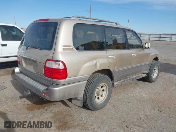 2000 Lexus LX 470 with VIN JT6HT00W0Y0098917, listed as a IAAI auction lot 41937661 with 180,980 mi miles and . Bid and sale history available at DreamBid. Image 4.