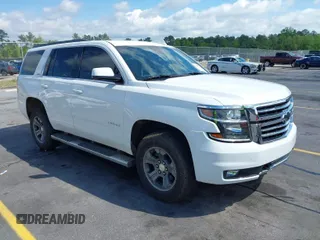 2017 Chevrolet Tahoe LT with VIN 1GNSKBKCXHR371798, listed as a IAAI auction lot 41997565 with 121,898 mi miles and . Bid and sale history available at DreamBid. Image 1.