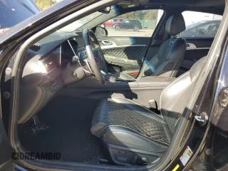 2021 Genesis G70 3.3T with VIN KMTG34LE7MU066534, listed as a Copart auction lot 77532704 with 58,951 mi miles and Salvage Title. Bid and sale history available at carsss.com. Image 7.