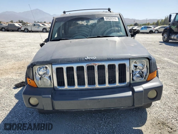 2007 Jeep Commander Limited with VIN 1J8HH58NX7C673663, listed as a Copart auction lot 69526944 with 146,191 mi miles and Salvage title. Bid and sale history available at DreamBid. Image 5.