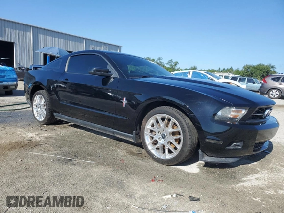 2012 Ford Mustang Premium with VIN 1ZVBP8AM4C5267344, listed as a Copart auction lot 58616155 with 118,484 mi miles and Salvage title. Bid and sale history available at DreamBid. Image 4.