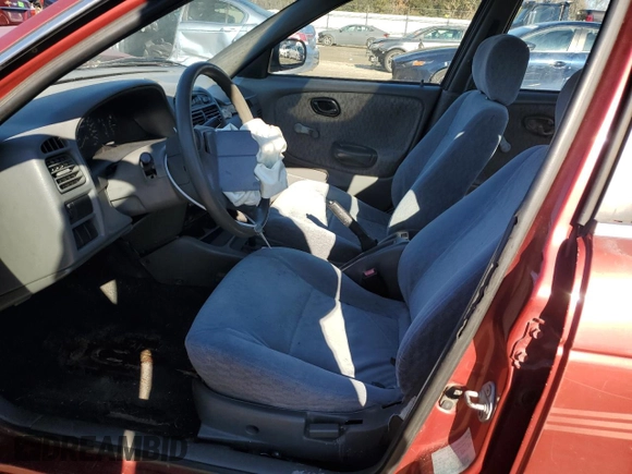 2001 Suzuki Esteem GL z VIN JS2GB41S915202412, wystawiony jako Copart lot #88372235 z przebiegiem 301 061 mil mil oraz Szkoda całkowita • Salvage title. Historia ofert i sprzedaży dostępna na DreamBid. Obrazek 7.