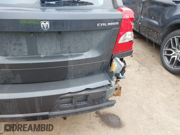 2011 Dodge Caliber Heat with VIN 1B3CB5HA7BD110672, listed as a IAAI auction lot 41709487 with 59,679 mi miles and . Bid and sale history available at DreamBid. Image 6.