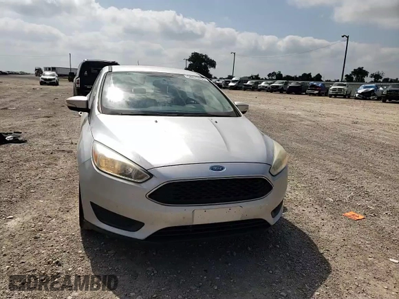 2015 Ford Focus SE z VIN 1FADP3F22FL343834, wystawiony jako Copart lot #58076265 z przebiegiem 101 891 mil mil oraz Szkoda całkowita • Salvage title. Historia ofert i sprzedaży dostępna na DreamBid. Obrazek 13.