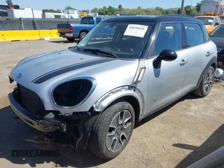 2012 MINI Countryman S with VIN WMWZC5C59CWL60076, listed as a IAAI auction lot 42078926 with 60,280 mi miles and . Bid and sale history available at DreamBid. Image 2.