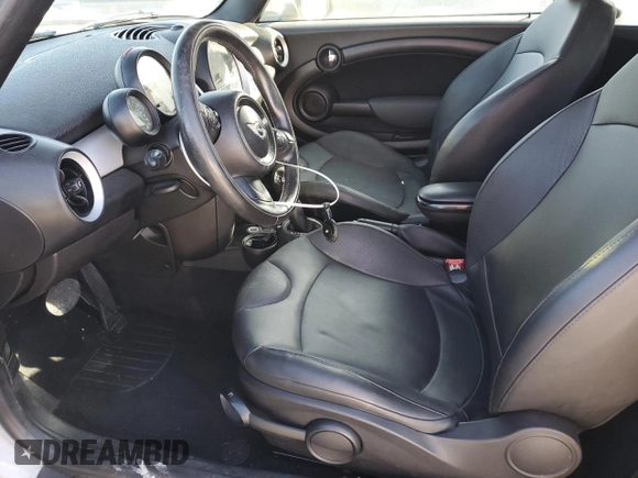 2015 MINI Convertible with VIN WMWZN3C50FT861992, listed as a Copart auction lot 84189754 with Not provided miles and Salvage title. Bid and sale history available at DreamBid. Image 7.