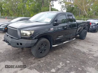 2011 Toyota Tundra 2WD Truck SR with VIN 5TFTY5F14BX007238, listed as a IAAI auction lot 41663289 with 126,499 mi miles. Bid and sale history available at carsss.com. Image 2.