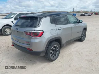 2020 Jeep Compass Trailhawk z VIN 3C4NJDDB5LT171727, wystawiony jako IAAI lot #41844523 z przebiegiem 103 952 mil mil oraz . Historia ofert i sprzedaży dostępna na DreamBid. Obrazek 4.