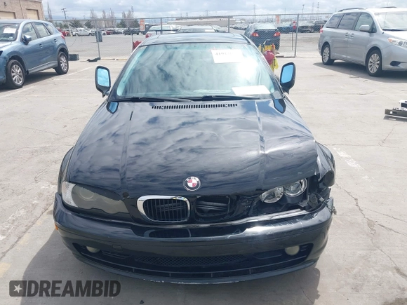 2002 BMW 3 Series 325Ci with VIN WBABN33482JW53230, listed as a IAAI auction lot 41912031 with 211,631 mi miles. Bid and sale history available at carsss.com. Image 12.