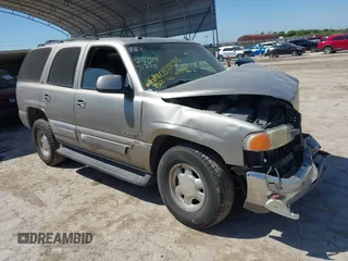 2003 GMC Yukon SLT z VIN 1GKEC13T73R169865, wystawiony jako IAAI lot #42238716 z przebiegiem Nie podano mil oraz . Historia ofert i sprzedaży dostępna na DreamBid. Obrazek 1.