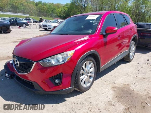 2015 Mazda CX-5 Grand Touring with VIN JM3KE4DY5F0469439, listed as a IAAI auction lot 42053851 with 70,676 mi miles. Bid and sale history available at carsss.com. Image 17.