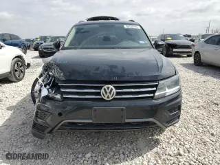 2018 Volkswagen Tiguan SEL with VIN 3VV3B7AX1JM055147, listed as a Copart auction lot 48154705 with 105,097 mi miles and Salvage Title. Bid and sale history available at carsss.com. Image 5.