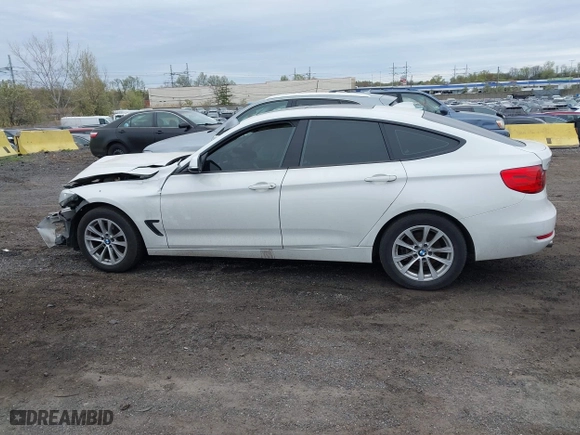 2014 BMW 3 Series Gran Turismo 328i xDrive with VIN WBA3X5C5XED559713, listed as a IAAI auction lot 42078622 with 68,233 mi miles. Bid and sale history available at carsss.com. Image 14.