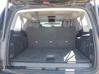2018 Chevrolet Suburban Premier z VIN 1GNSCJKC5JR386545, wystawiony jako IAAI lot #41684349 z przebiegiem 130 511 mil mil oraz . Historia ofert i sprzedaży dostępna na DreamBid. Obrazek 16.