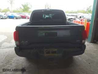 2019 Toyota Tacoma 4WD SR with VIN 3TMCZ5AN5KM204187, listed as a IAAI auction lot 40318136 with 105,409 mi miles. Bid and sale history available at carsss.com. Image 16.