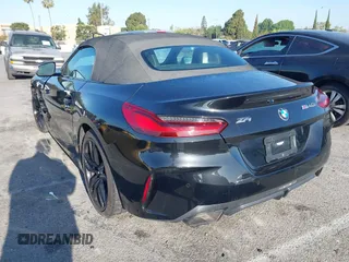2022 BMW Z4 sDriveM40i with VIN WBAHF9C08NWX88691, listed as a IAAI auction lot 42012469 with 11,108 mi miles. Bid and sale history available at carsss.com. Image 3.