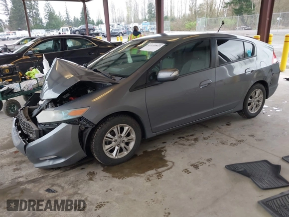 2010 Honda Insight EX with VIN JHMZE2H7XAS034098, listed as a IAAI auction lot 41939869 with 281,689 mi miles and . Bid and sale history available at DreamBid. Image 2.