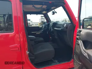 2014 Jeep Wrangler Unlimited Rubicon with VIN 1C4BJWFG0EL326979, listed as a IAAI auction lot 41913129 with 118,548 mi miles and . Bid and sale history available at DreamBid. Image 5.