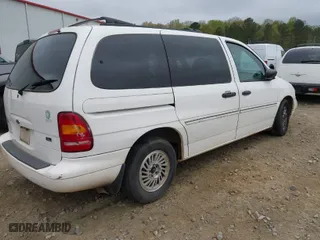 1998 Ford Windstar Wagon LX with VIN 2FMZA5148WBD66410, listed as a IAAI auction lot 41917365 with 229,928 mi miles. Bid and sale history available at carsss.com. Image 4.