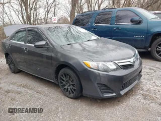 2014 Toyota Camry L z VIN 4T1BF1FK3EU322598, wystawiony jako IAAI lot #41490070 z przebiegiem 101 250 mil mil oraz . Historia ofert i sprzedaży dostępna na DreamBid. Obrazek 1.