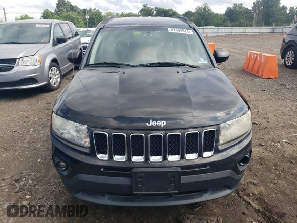 2011 Jeep Compass with VIN 1J4NT1FB7BD226943, listed as a Copart auction lot 65365234 with 134,574 mi miles and Salvage Title. Bid and sale history available at carsss.com. Image 5.