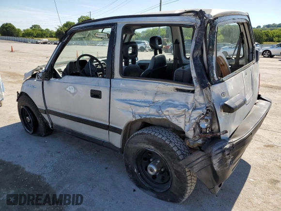 1991 Geo Tracker z VIN 2CNBJ18U3M6909006, wystawiony jako Copart lot #73638944 z przebiegiem 65 033 mil mil oraz Tytuł czysty. Historia ofert i sprzedaży dostępna na DreamBid. Obrazek 2.