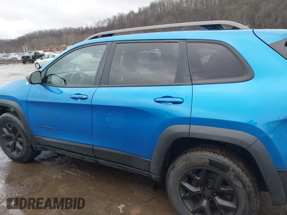 2018 Jeep Cherokee Trailhawk with VIN 1C4PJMBX3JD512813, listed as a IAAI auction lot 41457312 with 125,644 mi miles. Bid and sale history available at carsss.com. Image 15.