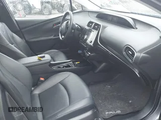 2019 Toyota Prius L Eco z VIN JTDKARFU7K3077941, wystawiony jako IAAI lot #41865759 z przebiegiem 254 612 mil mil oraz . Historia ofert i sprzedaży dostępna na DreamBid. Obrazek 5.