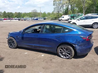 2022 Tesla Model 3 Long Range z VIN 5YJ3E1EB7NF180049, wystawiony jako IAAI lot #42188963 z przebiegiem 18 604 mil mil oraz . Historia ofert i sprzedaży dostępna na DreamBid. Obrazek 14.