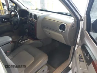 2003 GMC Envoy SLE with VIN 1GKDT13SX32319740, listed as a IAAI auction lot 41923578 with 210,811 mi miles. Bid and sale history available at carsss.com. Image 5.