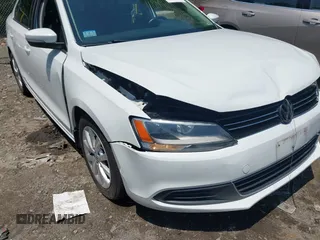 2014 Volkswagen Jetta SE with VIN 3VWD17AJ5EM437072, listed as a IAAI auction lot 42463048 with 99,030 mi miles and . Bid and sale history available at DreamBid. Image 6.