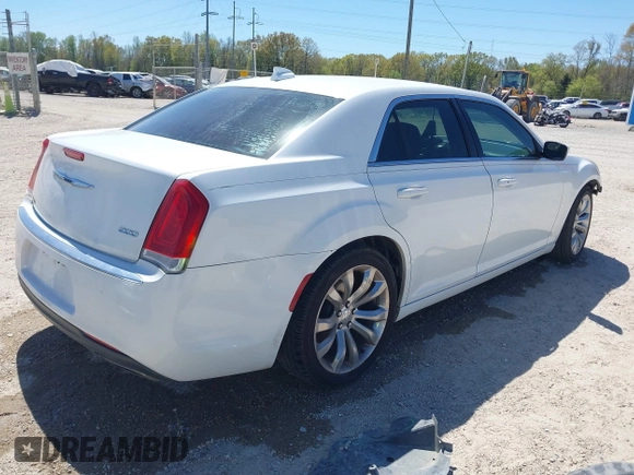 2016 Chrysler 300 Anniversary Edition with VIN 2C3CCAAG7GH313739, listed as a IAAI auction lot 41833824 with 285,806 mi miles and . Bid and sale history available at DreamBid. Image 4.
