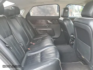 2014 Jaguar XJ with VIN SAJWJ2GD2E8V62696, listed as a Copart auction lot 76620494 with 85,487 mi miles and Salvage Title. Bid and sale history available at carsss.com. Image 10.