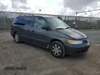 2004 Honda Odyssey EX-L with VIN 5FNRL18944B052617, listed as a Copart auction lot 51443625 with 144,346 mi miles and Salvage Title. Bid and sale history available at DreamBid. Image 4.