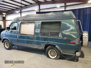 1994 Chevrolet Chevy Van с VIN 1GBEG25K3RF127301, выставлен на аукционе Copart как лот 37240394 с пробегом 128 576 миль миль и На запчасти • Non repairable. История ставок и продаж доступна на DreamBid. Изображение 2.