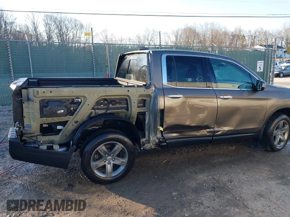 2022 Honda Ridgeline RTL-E with VIN 5FPYK3F79NB005152, listed as a IAAI auction lot 41754891 with 60,191 mi miles and . Bid and sale history available at DreamBid. Image 6.