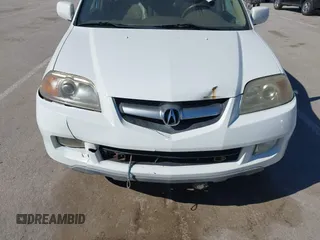 2004 Acura MDX Touring Pkg w/Navigation with VIN 2HNYD18844H524383, listed as a IAAI auction lot 41593278 with 253,003 mi miles. Bid and sale history available at carsss.com. Image 6.