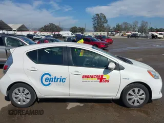 2014 Toyota Prius One with VIN JTDKDTB35E1561818, listed as a IAAI auction lot 42021039 with 184,584 mi miles and . Bid and sale history available at DreamBid. Image 13.