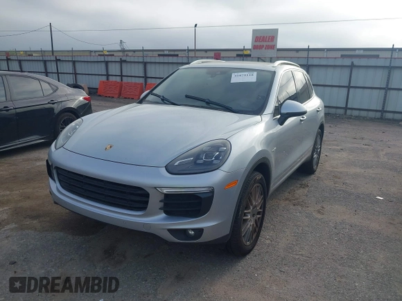 2016 Porsche Cayenne S E-Hybrid with VIN WP1AE2A26GLA59496, listed as a IAAI auction lot 41884022 with 85,386 mi miles and . Bid and sale history available at DreamBid. Image 17.