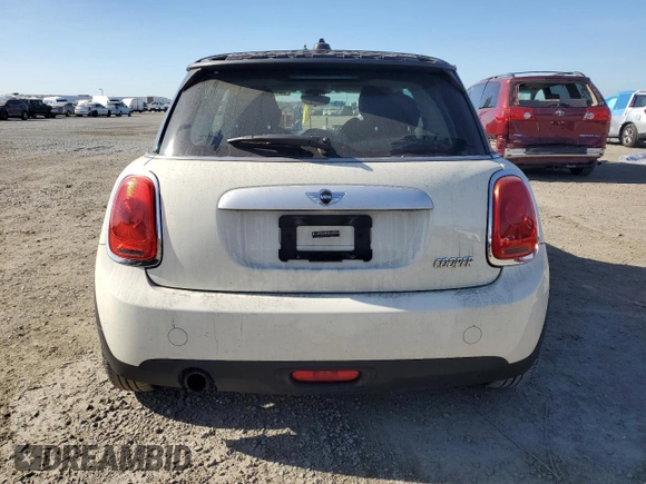 2014 MINI Hardtop with VIN WMWXM5C54ET934110, listed as a Copart auction lot 85128094 with 89,020 mi miles and Salvage Title. Bid and sale history available at DreamBid. Image 6.
