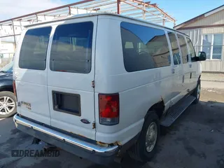 2008 Ford Econoline Passenger XL with VIN 1FBNE31L18DA20963, listed as a IAAI auction lot 41869182 with 150,027 mi miles. Bid and sale history available at carsss.com. Image 4.