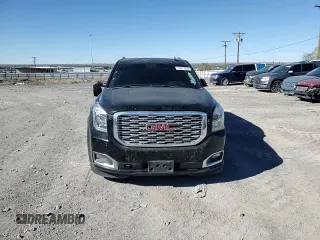 2018 GMC Yukon Denali with VIN 1GKS1CKJ0JR106589, listed as a Copart auction lot 79977034 with 98,022 mi miles and Salvage Title. Bid and sale history available at carsss.com. Image 12.