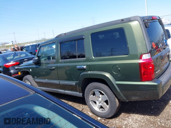 2007 Jeep Commander Sport with VIN 1J8HG48P97C691117, listed as a IAAI auction lot 41976259 with 260,996 mi miles. Bid and sale history available at carsss.com. Image 15.