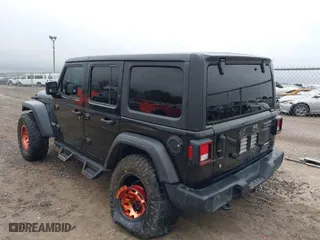 2019 Jeep Wrangler Unlimited Sport with VIN 1C4HJXDG7KW528649, listed as a IAAI auction lot 41029000 with 112,561 mi miles. Bid and sale history available at carsss.com. Image 3.