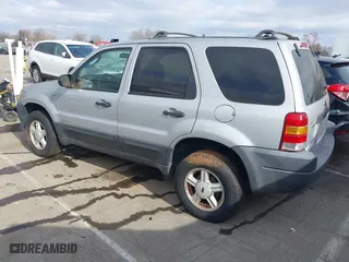 2002 Ford Escape XLT Choice with VIN 1FMYU03172KD11228, listed as a IAAI auction lot 41556852 with 250,677 mi miles. Bid and sale history available at carsss.com. Image 3.