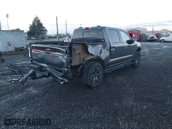 2023 Ford F-150 Lightning Pro z VIN 1FT6W1EV6PWG26596, wystawiony jako IAAI lot #40862334 z przebiegiem 13 857 mil mil oraz . Historia ofert i sprzedaży dostępna na DreamBid. Obrazek 4.