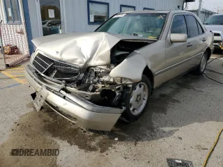 1997 Mercedes-Benz C with VIN WDBHA23EXVF601373, listed as a Copart auction lot 78402194 with 187,821 mi miles and Salvage title. Bid and sale history available at DreamBid. Image 1.