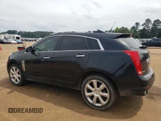 2014 Cadillac SRX Performance Collection z VIN 3GYFNCE38ES525883, wystawiony jako Copart lot #55085505 z przebiegiem 160 609 mil mil oraz Szkoda całkowita • Salvage title. Historia ofert i sprzedaży dostępna na DreamBid. Obrazek 2.